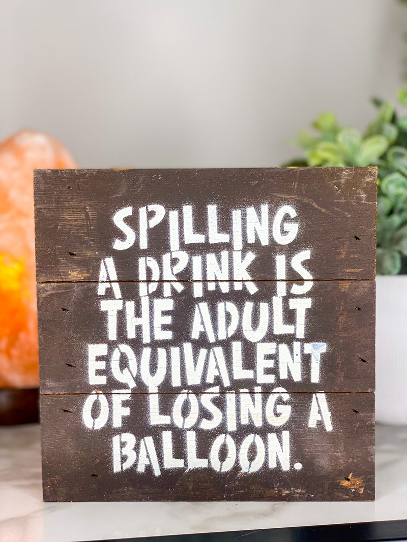 Spilling A Drink Sign